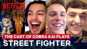 Cobra Kai Cast Plays Street Fighter II | #GeekedWeek